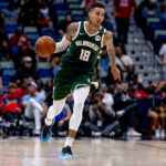 Apr 6, 2025; New Orleans, Louisiana, USA; Milwaukee Bucks forward Kyle Kuzma (18) brings the ball up court against the New Orleans Pelicans during the first half at Smoothie King Center. Mandatory Credit: Stephen Lew-Imagn Images