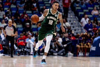 Apr 6, 2025; New Orleans, Louisiana, USA; Milwaukee Bucks forward Kyle Kuzma (18) brings the ball up court against the New Orleans Pelicans during the first half at Smoothie King Center. Mandatory Credit: Stephen Lew-Imagn Images