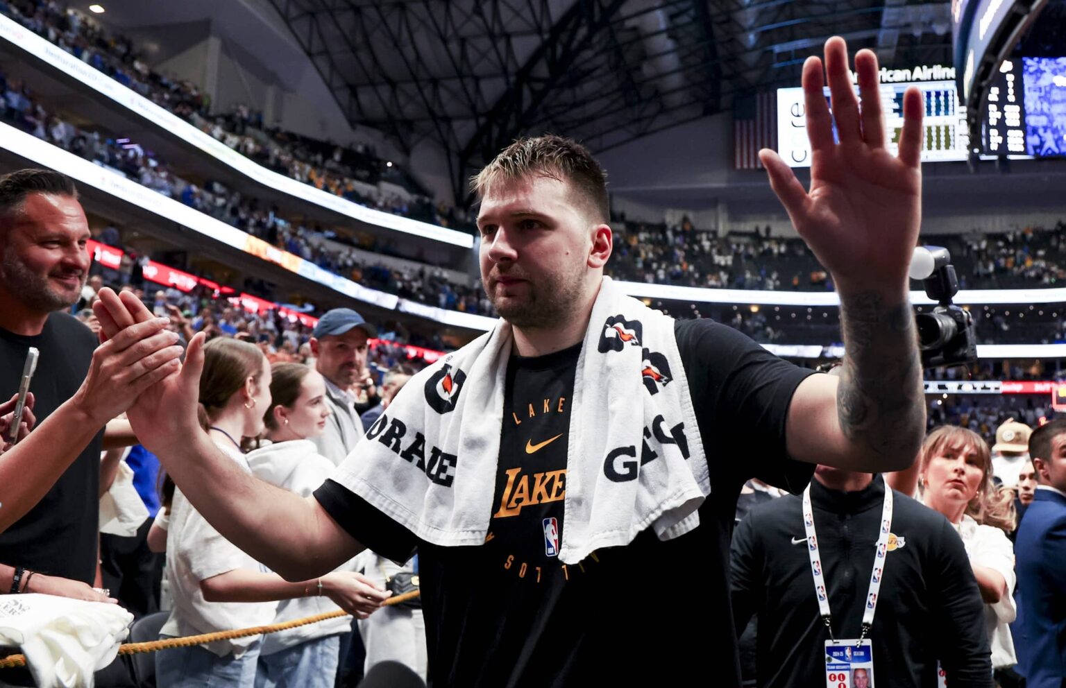 Apr 9, 2025; Dallas, Texas, USA; Los Angeles Lakers guard Luka Doncic (77) waves to fans after the game against the Dallas Mavericks at American Airlines Center. Mandatory Credit: Kevin Jairaj-Imagn Images