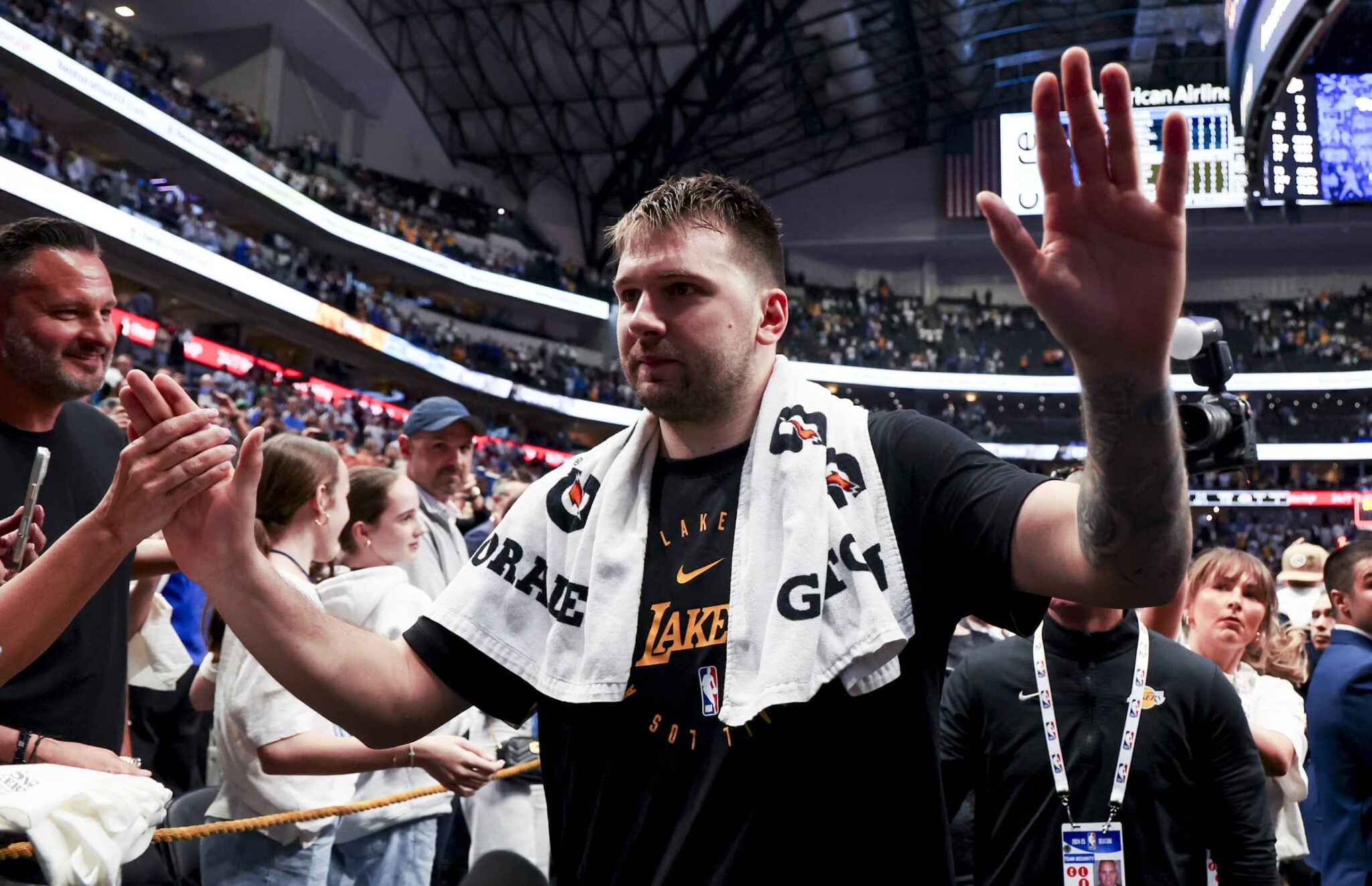 Apr 9, 2025; Dallas, Texas, USA; Los Angeles Lakers guard Luka Doncic (77) waves to fans after the game against the Dallas Mavericks at American Airlines Center. Mandatory Credit: Kevin Jairaj-Imagn Images