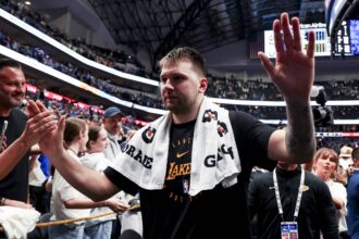 Apr 9, 2025; Dallas, Texas, USA; Los Angeles Lakers guard Luka Doncic (77) waves to fans after the game against the Dallas Mavericks at American Airlines Center. Mandatory Credit: Kevin Jairaj-Imagn Images