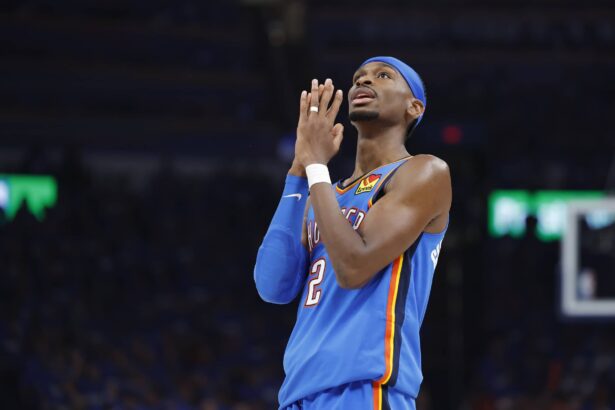 May 22, 2025; Oklahoma City, Oklahoma, USA; Oklahoma City Thunder guard Shai Gilgeous-Alexander (2) reacts after a play against the Minnesota Timberwolves in the third quarter during game two of the western conference finals for the 2025 NBA Playoffs at Paycom Center. Mandatory Credit: Alonzo Adams-Imagn Images