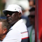 Sep 26, 2025; Bethpage, New York, USA; Former basketball player Michael Jordan watches during the four-balls on the first day of competition for the Ryder Cup at Bethpage Black. Mandatory Credit: Paul Childs-Reuters via Imagn Images