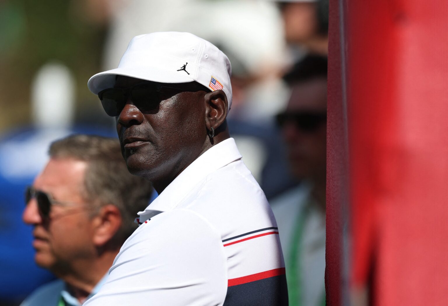 Sep 26, 2025; Bethpage, New York, USA; Former basketball player Michael Jordan watches during the four-balls on the first day of competition for the Ryder Cup at Bethpage Black. Mandatory Credit: Paul Childs-Reuters via Imagn Images