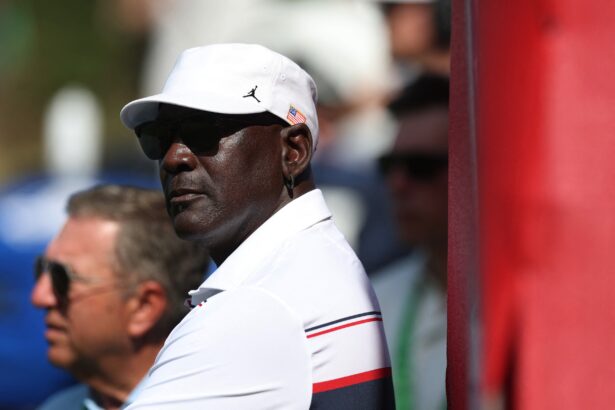 Sep 26, 2025; Bethpage, New York, USA; Former basketball player Michael Jordan watches during the four-balls on the first day of competition for the Ryder Cup at Bethpage Black. Mandatory Credit: Paul Childs-Reuters via Imagn Images