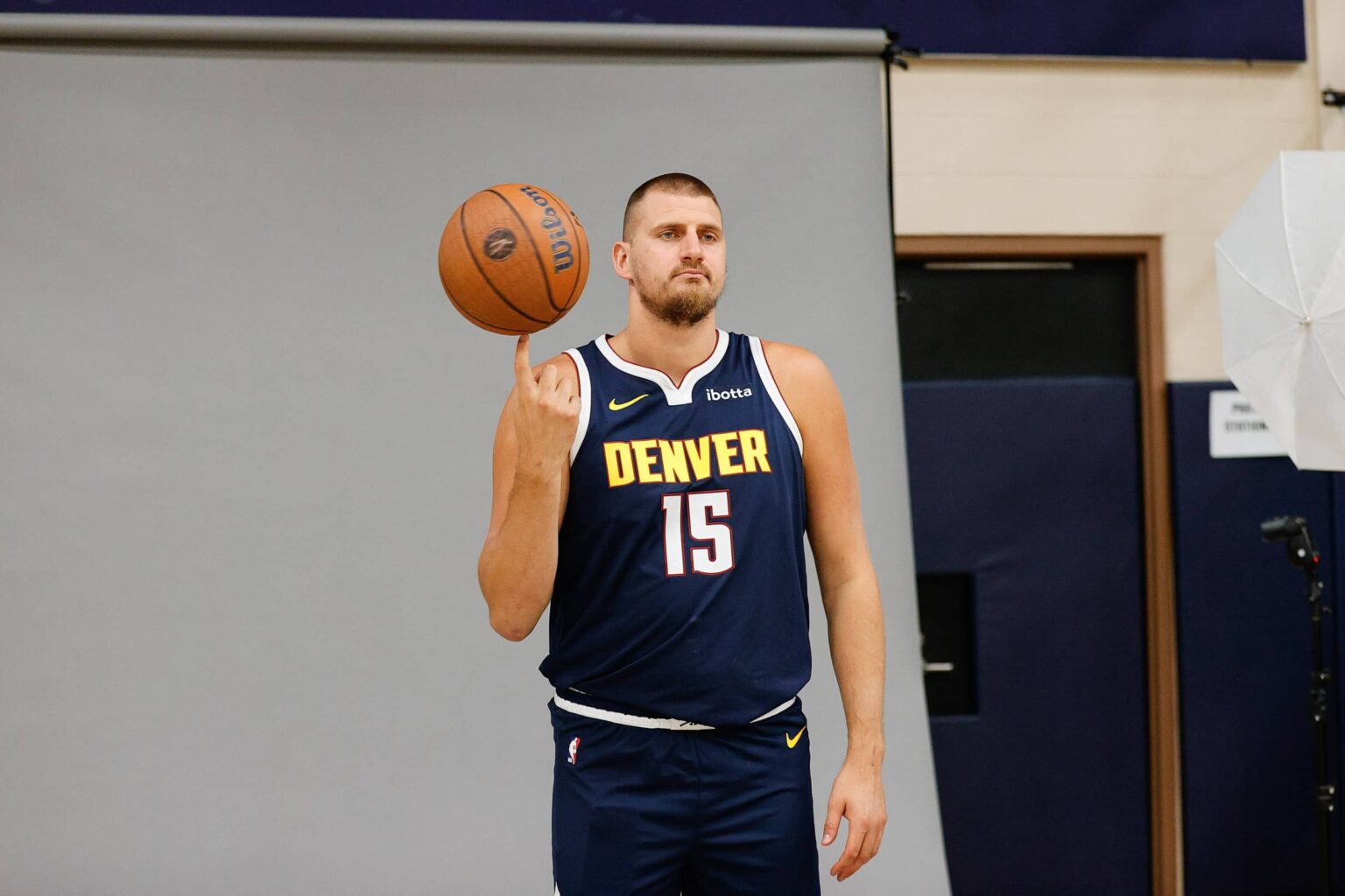 Sep 29, 2025; Denver, CO, USA; Denver Nuggets player Nikola Jokic (15) poses for a picture during media day at Ball Arena. Mandatory Credit: Isaiah J. Downing-Imagn Images