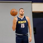 Sep 29, 2025; Denver, CO, USA; Denver Nuggets player Nikola Jokic (15) poses for a picture during media day at Ball Arena. Mandatory Credit: Isaiah J. Downing-Imagn Images