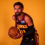 Sep 29, 2025; Atlanta, GA, USA; Atlanta Hawks guard Trae Young (11) poses for a photo at media day. Mandatory Credit: Brett Davis-Imagn Images