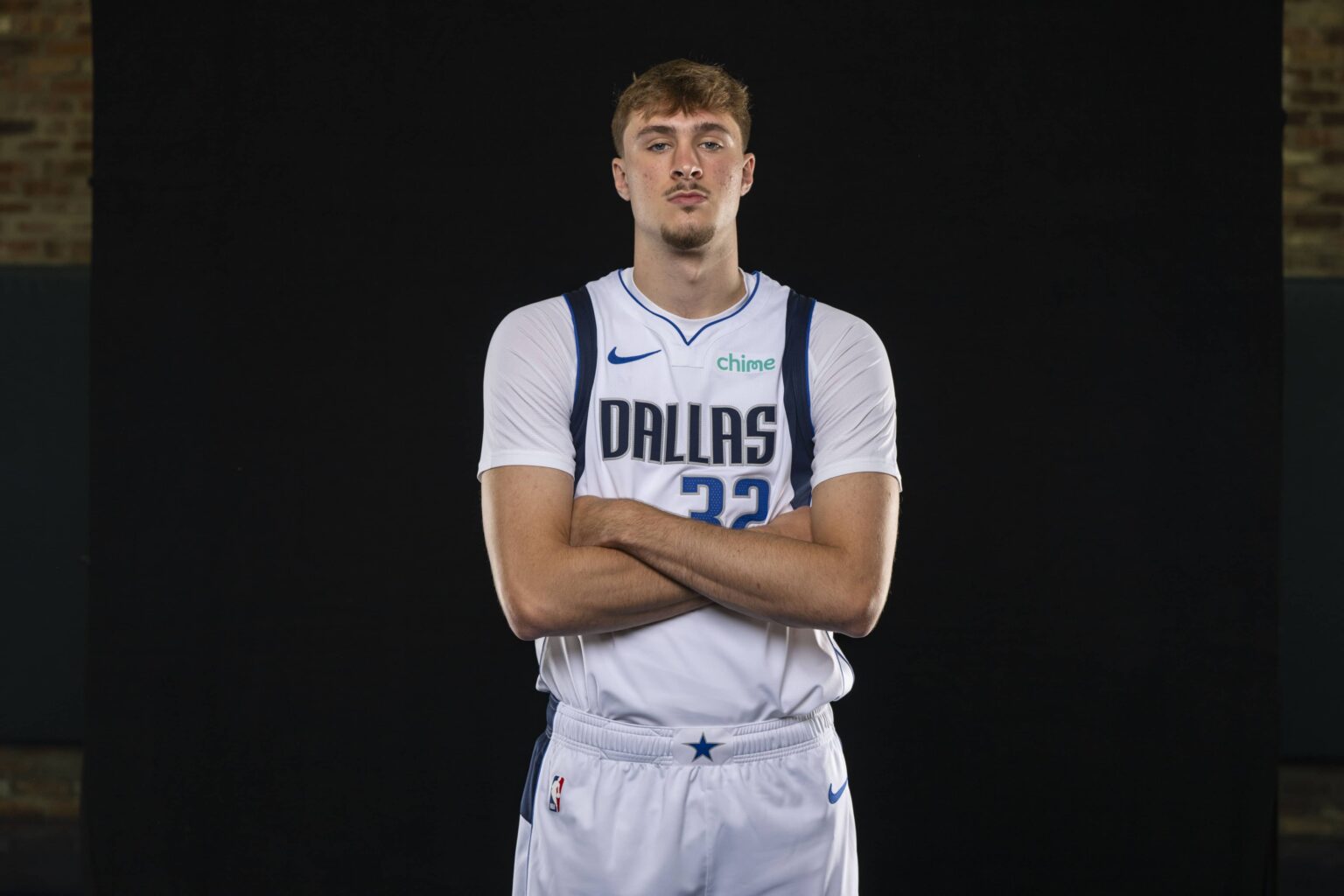Sep 29, 2025; Dallas, TX, USA; Dallas Mavericks forward Cooper Flagg (32) poses for a photo during the Mavericks 2025 media day at the American Airlines Center. Mandatory Credit: Jerome Miron-Imagn Images