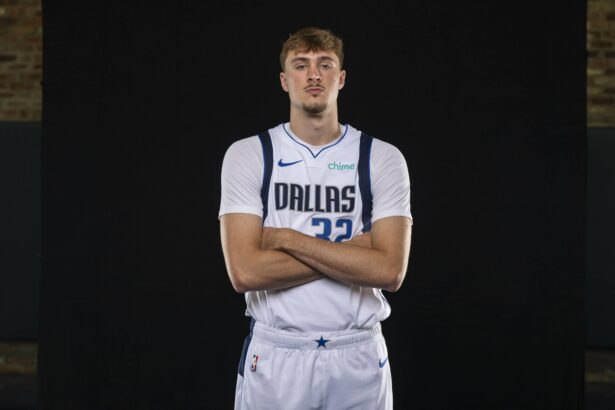 Sep 29, 2025; Dallas, TX, USA; Dallas Mavericks forward Cooper Flagg (32) poses for a photo during the Mavericks 2025 media day at the American Airlines Center. Mandatory Credit: Jerome Miron-Imagn Images