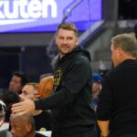 Oct 5, 2025; San Francisco, California, USA; Los Angeles Lakers forward/guard Luka Doncic (77) watches the action from the bench during a game against the Golden State Warriors in the second quarter at Chase Center. Mandatory Credit: David Gonzales-Imagn Images