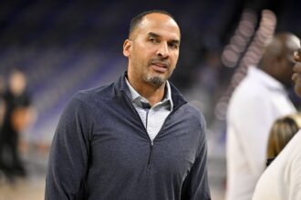 Oct 6, 2025; Fort Worth, Texas, USA; Dallas Mavericks general manager Nico Harrison looks on before the game against the Oklahoma City Thunder at Dickie's Arena. Mandatory Credit: Jerome Miron-Imagn Images