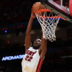 Oct 6, 2025; Miami, Florida, USA; Miami Heat forward Andrew Wiggins (22) dunks against the Milwaukee Bucks during the first quarter at Kaseya Center. Mandatory Credit: Sam Navarro-Imagn Images