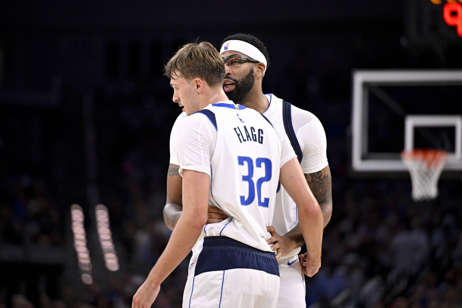 Oct 6, 2025; Fort Worth, Texas, USA; Dallas Mavericks forward/center Anthony Davis (3) talks with forward Cooper Flagg (32) during the second quarter at Dickie's Arena. Mandatory Credit: Jerome Miron-Imagn Images