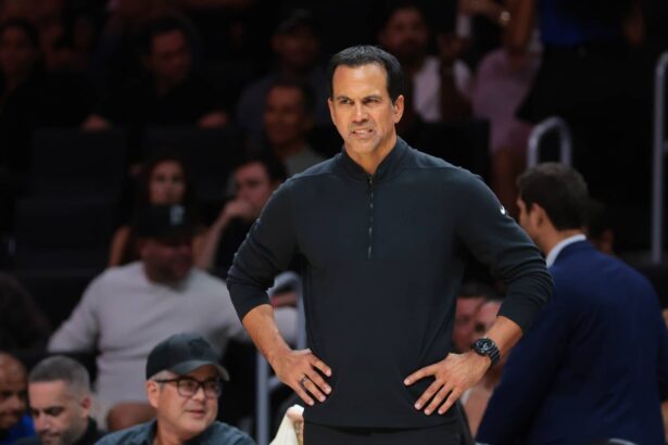 Oct 6, 2025; Miami, Florida, USA; Miami Heat Head Coach Erik Spoelstra reacts against the Milwaukee Bucks during the first quarter at Kaseya Center. Mandatory Credit: Sam Navarro-Imagn Images