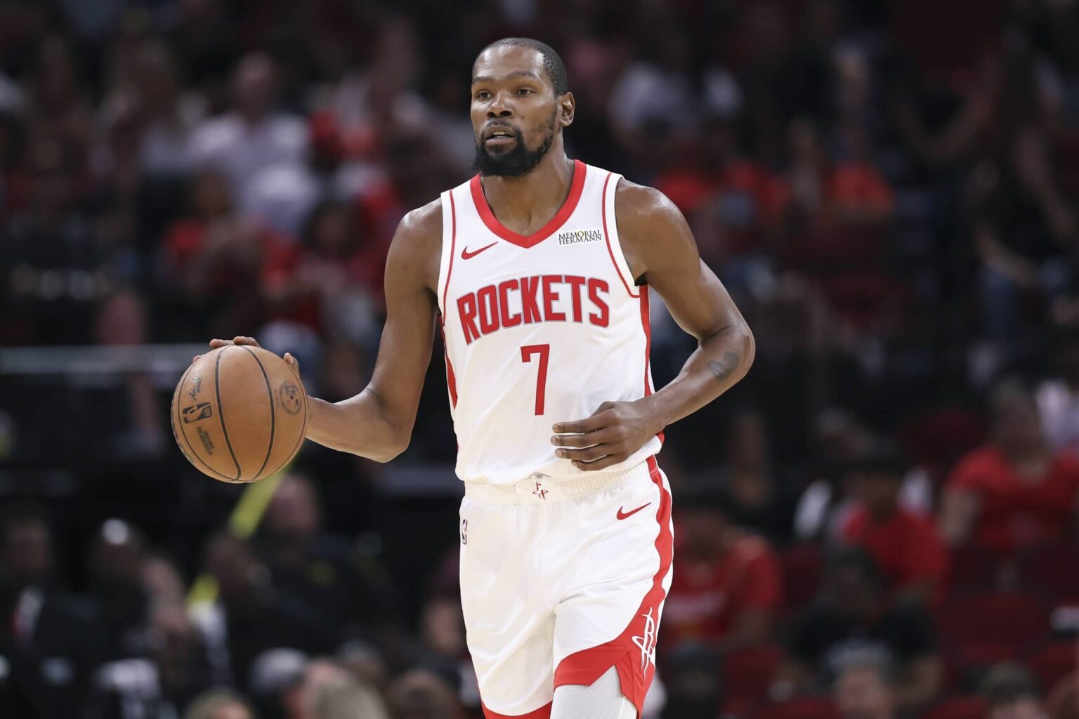 Oct 8, 2025; Houston, Texas, USA; Houston Rockets forward Kevin Durant (7) brings the ball up the court during the third quarter against the Utah Jazz at Toyota Center. Mandatory Credit: Troy Taormina-Imagn Images
