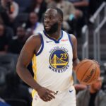 Golden State Warriors forward Draymond Green (23) dribbles upcourt against the Los Angeles Lakers in the second quarter at Chase Center.