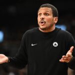 Oct 10, 2025; Toronto, Ontario, CAN; Boston Celtics head coach Joe Mazzulla gestures as he speaks with game officials in the second half against the Toronto Raptors at Scotiabank Arena. Mandatory Credit: Dan Hamilton-Imagn Images