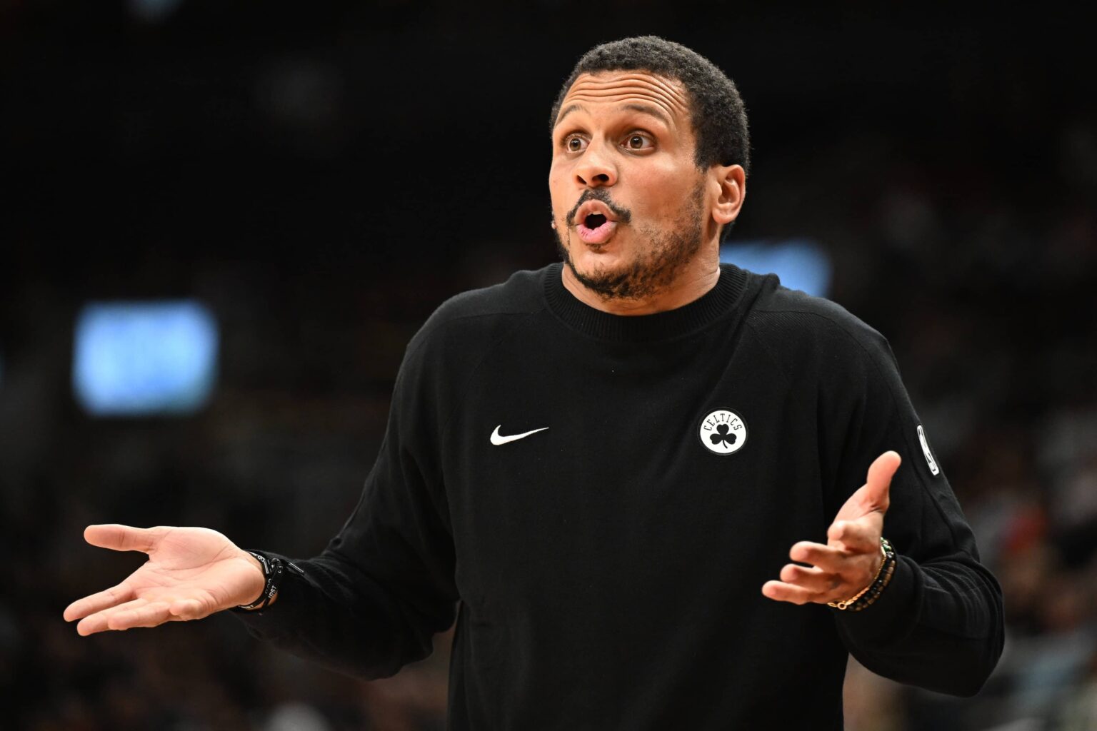 Oct 10, 2025; Toronto, Ontario, CAN; Boston Celtics head coach Joe Mazzulla gestures as he speaks with game officials in the second half against the Toronto Raptors at Scotiabank Arena. Mandatory Credit: Dan Hamilton-Imagn Images