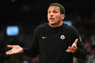 Oct 10, 2025; Toronto, Ontario, CAN; Boston Celtics head coach Joe Mazzulla gestures as he speaks with game officials in the second half against the Toronto Raptors at Scotiabank Arena. Mandatory Credit: Dan Hamilton-Imagn Images