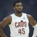 Oct 14, 2025; Cleveland, Ohio, USA; Cleveland Cavaliers guard Donovan Mitchell (45) stands on the court in the first quarter against the Detroit Pistons at Rocket Arena. Mandatory Credit: David Richard-Imagn Images