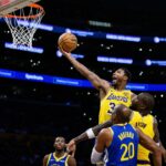 Oct 21, 2025; Los Angeles, California, USA; Los Angeles Lakers guard Marcus Smart (36) shoots during the first half against the Golden State Warriors at Crypto.com Arena. Mandatory Credit: William Liang-Imagn Images