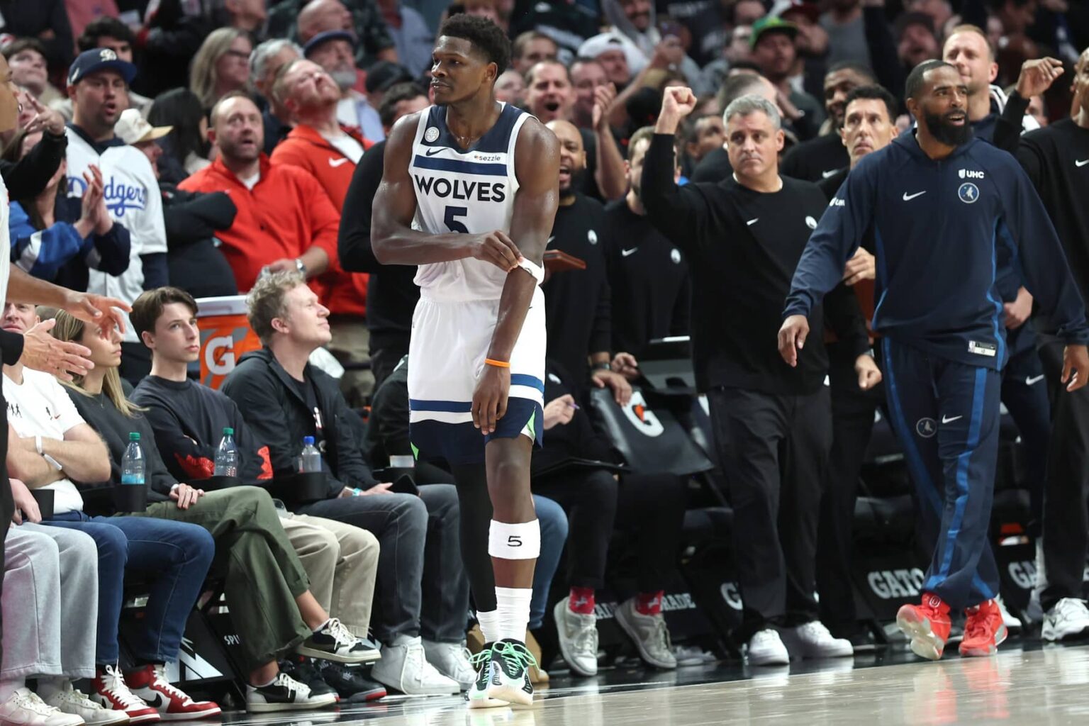 Oct 22, 2025; Portland, Oregon, USA; Minnesota Timberwolves guard Anthony Edwards (5) reacts after making a three-point shot against the Portland Trail Blazers in the second half at Moda Center. Mandatory Credit: Jaime Valdez-Imagn Images