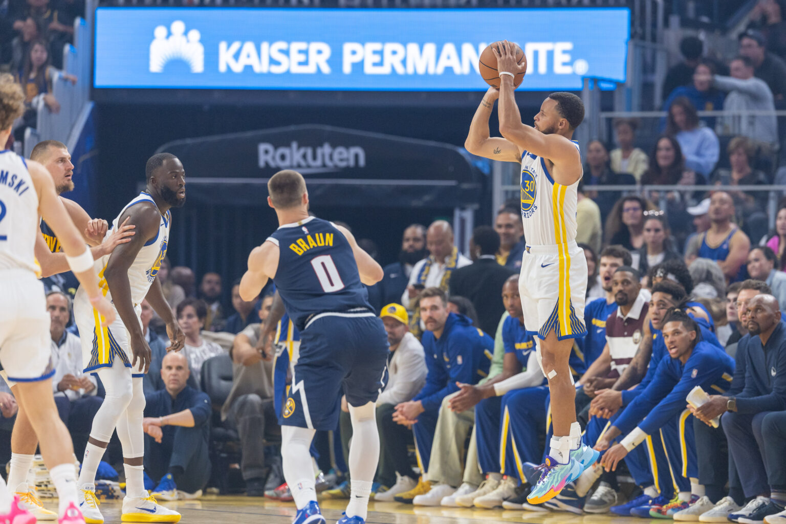 Oct 23, 2025; San Francisco, California, USA; Golden State Warriors guard Stephen Curry (30) puts up a shot against the Denver Nuggets during the first quarter at Chase Center. Mandatory Credit: Bob Kupbens-Imagn Images