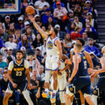 Oct 23, 2025; San Francisco, California, USA; Golden State Warriors guard Stephen Curry (30) puts up a shot against the Denver Nuggets during the second quarter at Chase Center. Mandatory Credit: Bob Kupbens-Imagn Images