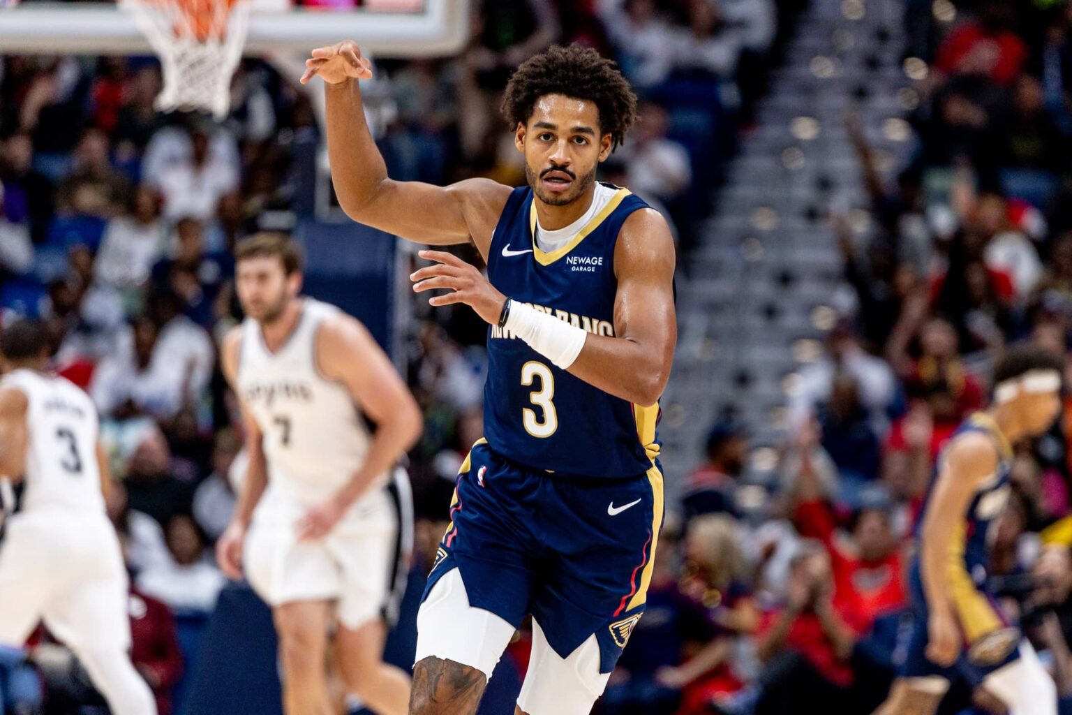 Oct 24, 2025; New Orleans, Louisiana, USA; New Orleans Pelicans guard Jordan Poole (3) reacts to making a three point basket against the San Antonio Spurs during the first half at Smoothie King Center. Mandatory Credit: Stephen Lew-Imagn Images