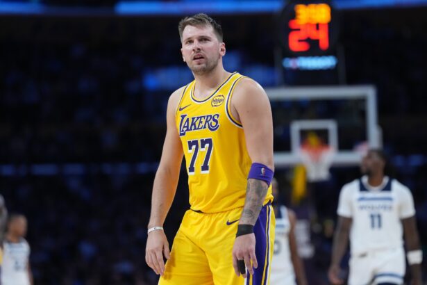 Oct 24, 2025; Los Angeles, California, USA; Los Angeles Lakers guard Luka Doncic (77) reacts in the second half against the Minnesota Timberwolves at Crypto.com Arena. Mandatory Credit: Kirby Lee-Imagn Images
