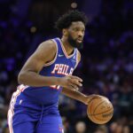 Oct 25, 2025; Philadelphia, Pennsylvania, USA; Philadelphia 76ers center Joel Embiid (21) controls the ball against the Charlotte Hornets during the first quarter at Xfinity Mobile Arena. Mandatory Credit: Bill Streicher-Imagn Images