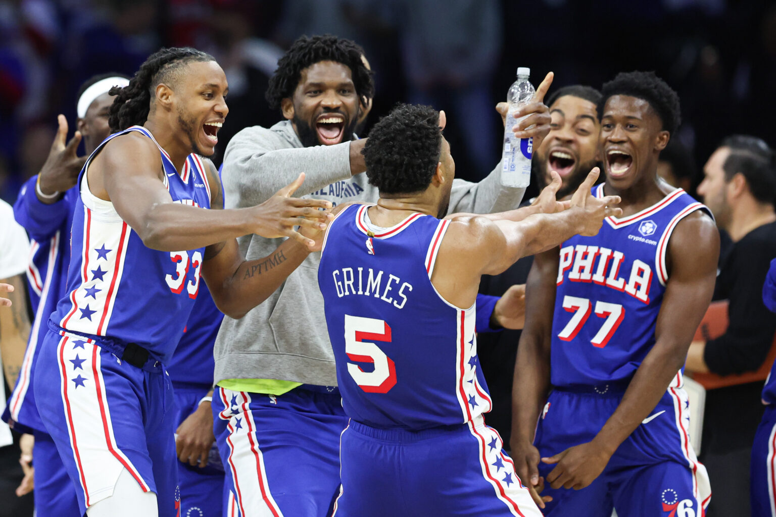 Oct 25, 2025; Philadelphia, Pennsylvania, USA; Philadelphia 76ers guard Quentin Grimes (5) celebrates with teammates after his score in the closing seconds of the fourth quarter against the Charlotte Hornets at Xfinity Mobile Arena. Mandatory Credit: Bill Streicher-Imagn Images