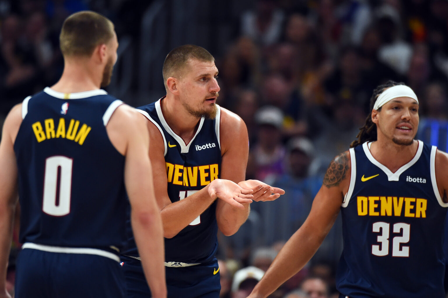 Oct 25, 2025; Denver, Colorado, USA; Denver Nuggets center Nikola Jokic (15) reacts after being called for a foul during the first half against the Phoenix Suns at Ball Arena. Mandatory Credit: Christopher Hanewinckel-Imagn Images