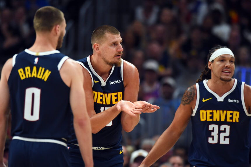 Oct 25, 2025; Denver, Colorado, USA; Denver Nuggets center Nikola Jokic (15) reacts after being called for a foul during the first half against the Phoenix Suns at Ball Arena. Mandatory Credit: Christopher Hanewinckel-Imagn Images