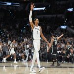 Oct 26, 2025; San Antonio, Texas, USA; San Antonio Spurs forward Victor Wembanyama (1) celebrates in the first half against the Brooklyn Nets at Frost Bank Center. Mandatory Credit: Daniel Dunn-Imagn Images