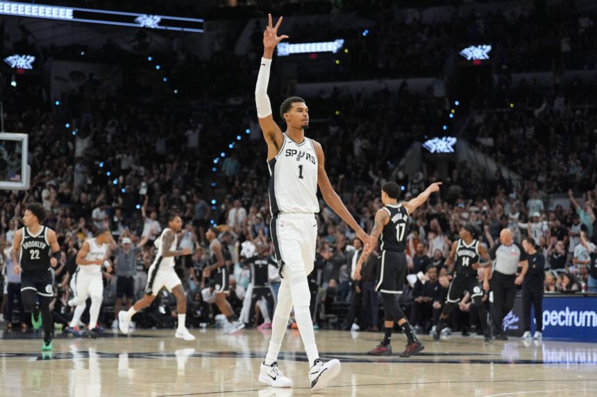 Oct 26, 2025; San Antonio, Texas, USA; San Antonio Spurs forward Victor Wembanyama (1) celebrates in the first half against the Brooklyn Nets at Frost Bank Center. Mandatory Credit: Daniel Dunn-Imagn Images