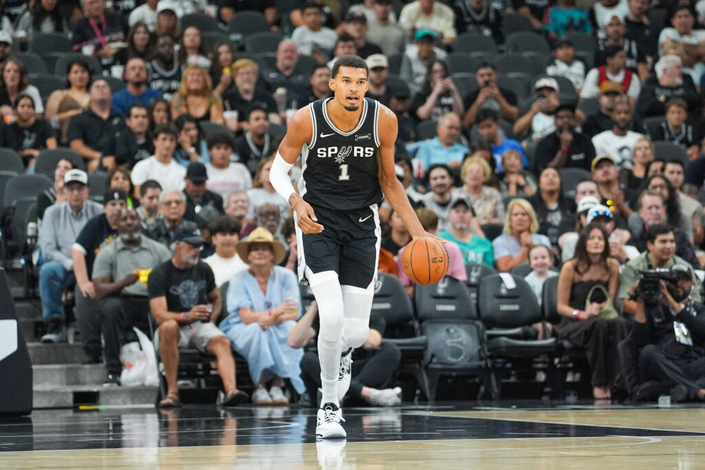 Oct 27, 2025; San Antonio, Texas, USA; San Antonio Spurs forward/center Victor Wembanyama (1) dribbles up the court in the first half against the Toronto Raptors at Frost Bank Center. Mandatory Credit: Daniel Dunn-Imagn Images