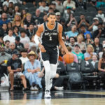 Oct 27, 2025; San Antonio, Texas, USA; San Antonio Spurs forward/center Victor Wembanyama (1) dribbles up the court in the first half against the Toronto Raptors at Frost Bank Center. Mandatory Credit: Daniel Dunn-Imagn Images