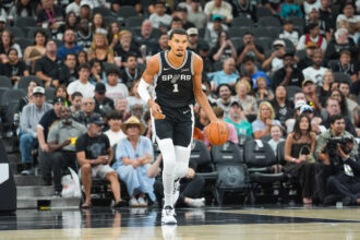 Oct 27, 2025; San Antonio, Texas, USA; San Antonio Spurs forward/center Victor Wembanyama (1) dribbles up the court in the first half against the Toronto Raptors at Frost Bank Center. Mandatory Credit: Daniel Dunn-Imagn Images