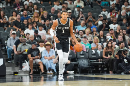 Oct 27, 2025; San Antonio, Texas, USA; San Antonio Spurs forward/center Victor Wembanyama (1) dribbles up the court in the first half against the Toronto Raptors at Frost Bank Center. Mandatory Credit: Daniel Dunn-Imagn Images