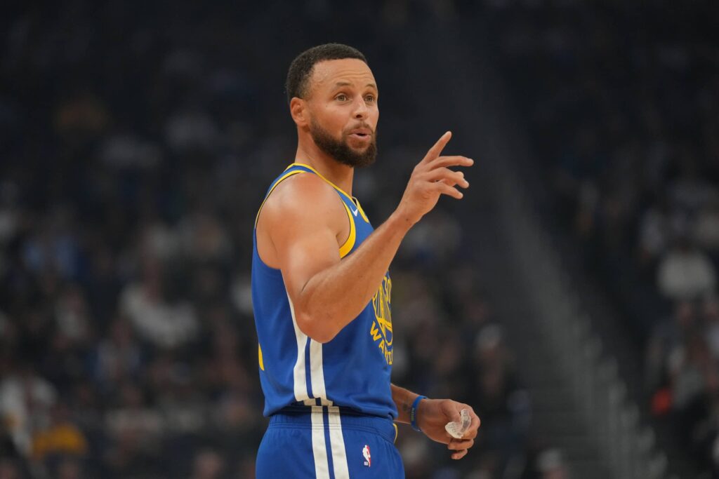 Oct 27, 2025; San Francisco, California, USA; Golden State Warriors guard Stephen Curry (30) directs teammates during a break in the action against the Memphis Grizzlies in the first quarter at the Chase Center. Mandatory Credit: Cary Edmondson-Imagn Images