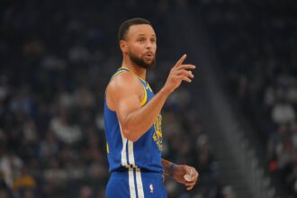 Oct 27, 2025; San Francisco, California, USA; Golden State Warriors guard Stephen Curry (30) directs teammates during a break in the action against the Memphis Grizzlies in the first quarter at the Chase Center. Mandatory Credit: Cary Edmondson-Imagn Images