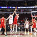 Oct 27, 2025; Chicago, Illinois, USA; Chicago Bulls center Nikola Vucevic (9) battles for the ball with Atlanta Hawks center Kristaps Porzingis (8) at the tip-off of an NBA game at United Center. Mandatory Credit: Kamil Krzaczynski-Imagn Images