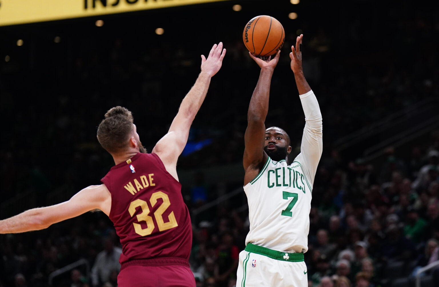 Oct 29, 2025; Boston, Massachusetts, USA; Boston Celtics guard/forward Jaylen Brown (7) shoots the ball against Cleveland Cavaliers forward/center Dean Wade (32) in the last seconds of the second quarter at TD Garden. Mandatory Credit: David Butler II-Imagn Images