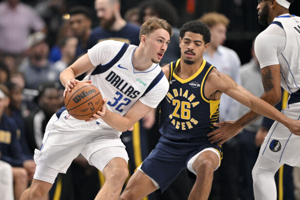 Oct 29, 2025; Dallas, Texas, USA; Dallas Mavericks forward Cooper Flagg (32) moves to the basket past Indiana Pacers guard Ben Sheppard (26) during the first quarter at the American Airlines Center. Mandatory Credit: Jerome Miron-Imagn Images