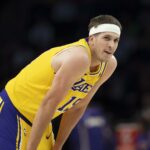 Oct 29, 2025; Minneapolis, Minnesota, USA; Los Angeles Lakers guard Austin Reaves (15) looks on against the Minnesota Timberwolves in the first half at Target Center. Mandatory Credit: Jesse Johnson-Imagn Images