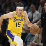 Oct 29, 2025; Minneapolis, Minnesota, USA; Los Angeles Lakers guard Austin Reaves (15) dribbles the ball against the Minnesota Timberwolves in the second half at Target Center. Mandatory Credit: Jesse Johnson-Imagn Images