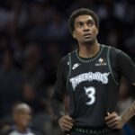 Timberwolves forward Jaden McDaniels looks on against the Lakers in the second half at Target Center