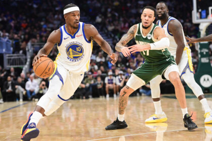 Oct 30, 2025; Milwaukee, Wisconsin, USA; Golden State Warriors forward Jimmy Butler (10) drives for the basket against Milwaukee Bucks forward Amir Coffey (17) in the second quarter at Fiserv Forum. Mandatory Credit: Benny Sieu-Imagn Images
